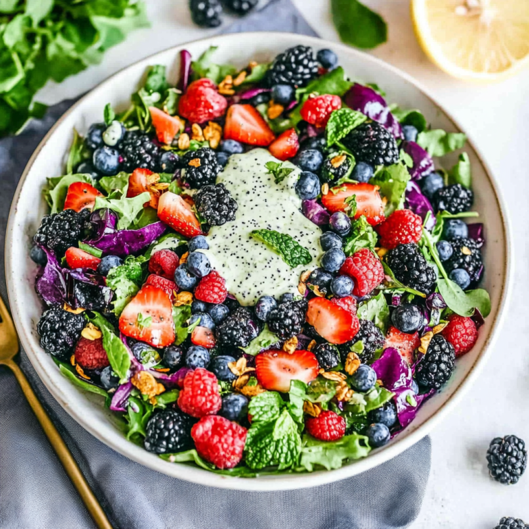 Superfood Berry Salad with Creamy Lemon Herb Dressing is a must-try!
