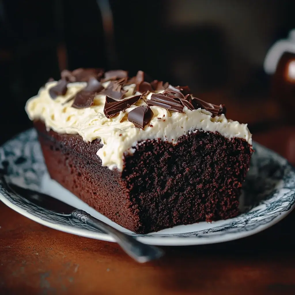 Rich Chocolate Loaf Cake with Bailey's Cream Cheese Frosting is a must-try!